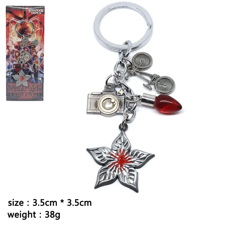 

New Arrival Stranger Things Key Chain Novel Bag Parts Accessories Light Bulb Pendant Gun Key Ring Camera Key Chains Novel Gifts