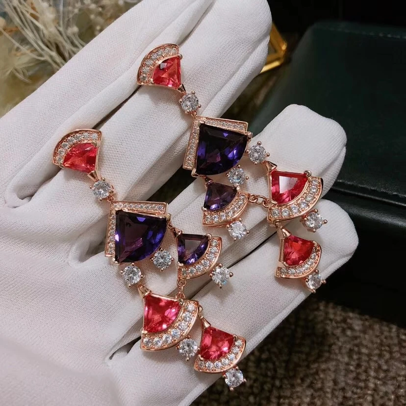 

Luxury jewelry. High quality S925 color stone skirt pure Tremella nails. Triangle stitching popular earrings, banquet parties.