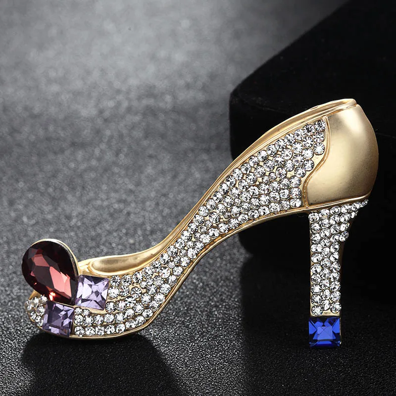 black heels with brooch