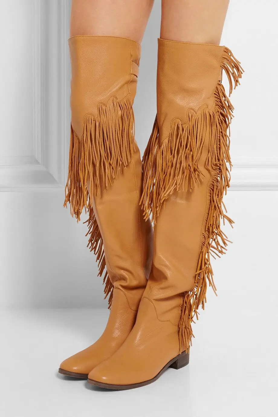 red boots with tassels