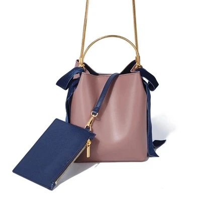 

Singapore women's bag 2018 bucket bag bow decoration metal handle bucket bag luxury handbags women bags designer