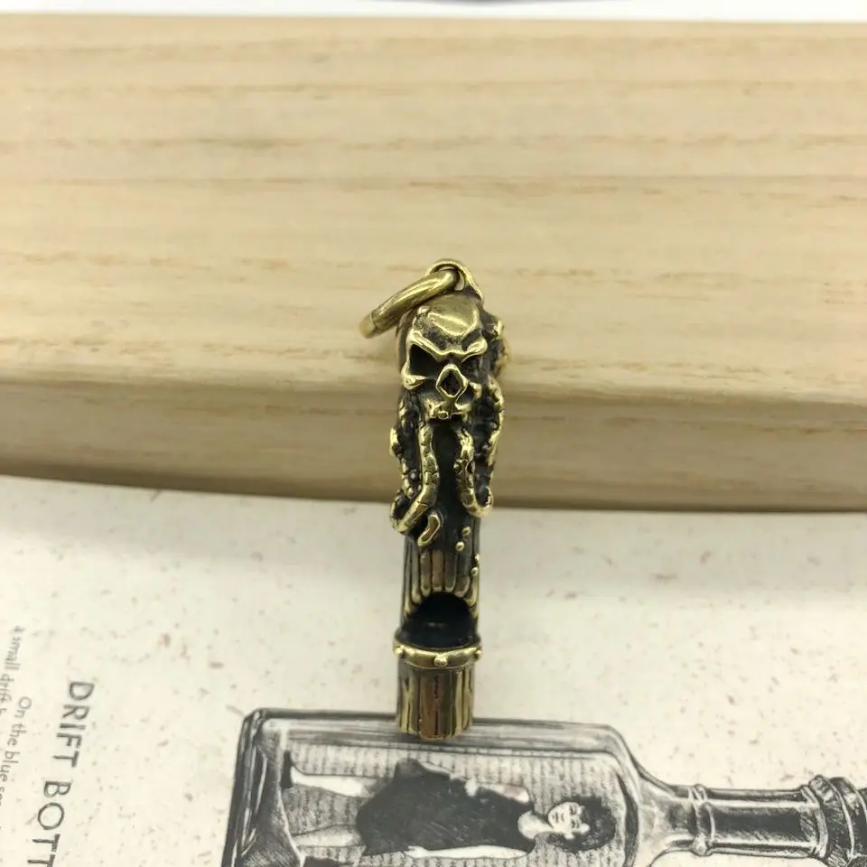 

EDC Brass Emergency Safety Survival Aid Whistle Octopus Skull Pendant Keychain