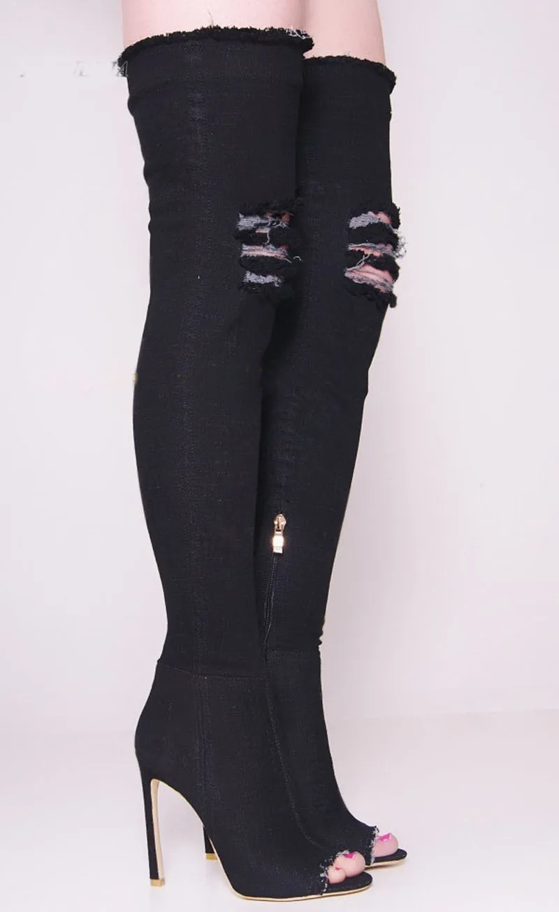 thigh high boots with ripped jeans