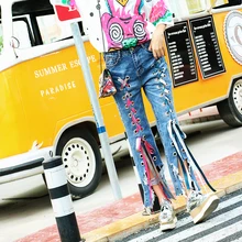 Тайская волна бренд личности нерегулярные отверстие джинсы свободные повседневные выдалбливают крест ремень повязки брюки для женщин