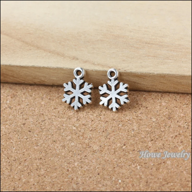 

Wholesale 65 pcs ancient silver Christmas snowflake Pendant alloy DIY Fashion charm Bracelet Necklace Jewelry accessories 20118