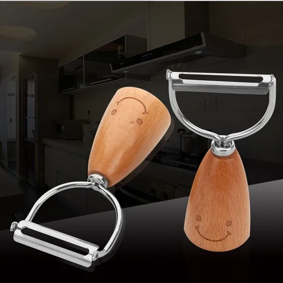 

1PC New 430 Stainless Steel Korean Smile Face Cartoon Wooden Peeler Tableware Flatware Wooden handle Peeler KX 224