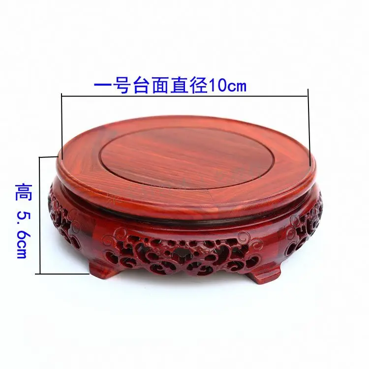 Red wingceltis of solid wood carving round base household act the role ofing is tasted annatto handicraft furnishing articles