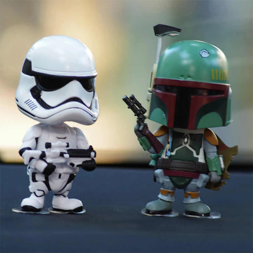 Baratos Adorno de coche decoración Linda muñeca cabeza agitada para Star Wars Stormtrooper Boba Fett figura de acción Auto Interior Bobblehead Juguetes