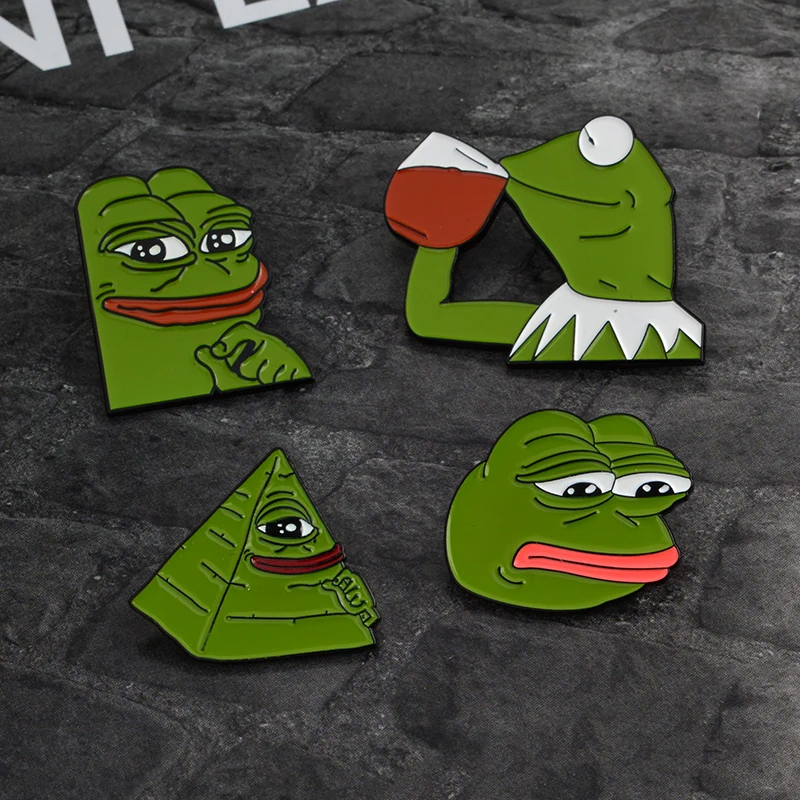 

Sad Pepe the Frog Brooch Enamel Green Animal Frog Pins Badge Denim jacket Bag Shirt Accessories Lapel Pin Jewelry Gift for Kids