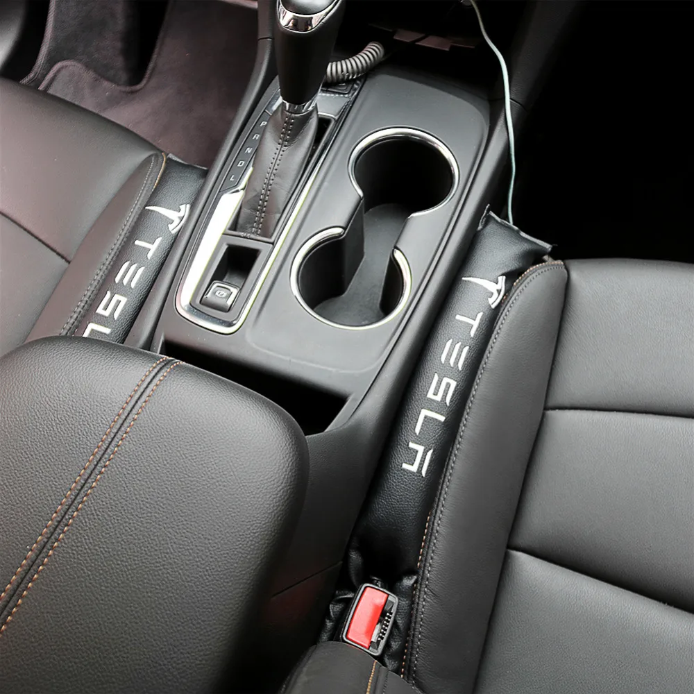 

2pcs/lot Styling Car Seat Gap Cover Stopper PU Leather Leak Pad Cushion with Logo Accessories for Tesla Model S Model X Model 3