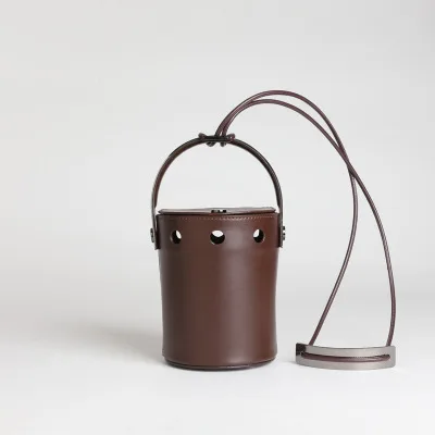 

Zhixiansheng with the same paragraph clam bucket bag ladies leather one shoulder portable round hole bucket bag