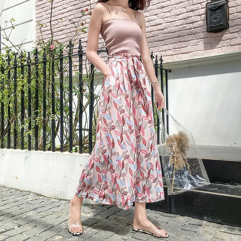 

Snow spinning leaves printed wide-legged women's trousers, high waist strap beach vacation Bigfoot nine points skirts