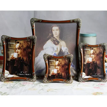 

Hot Selling Newest 4 Inch Metal Photo Frame Life Wedding Photo Photo Creative Pendulum Photo Studio Picture Desktop Frame