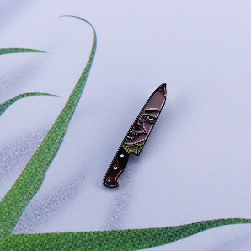 

Pennywise clown face badge killer knife brooch Stephen King IT movie pin