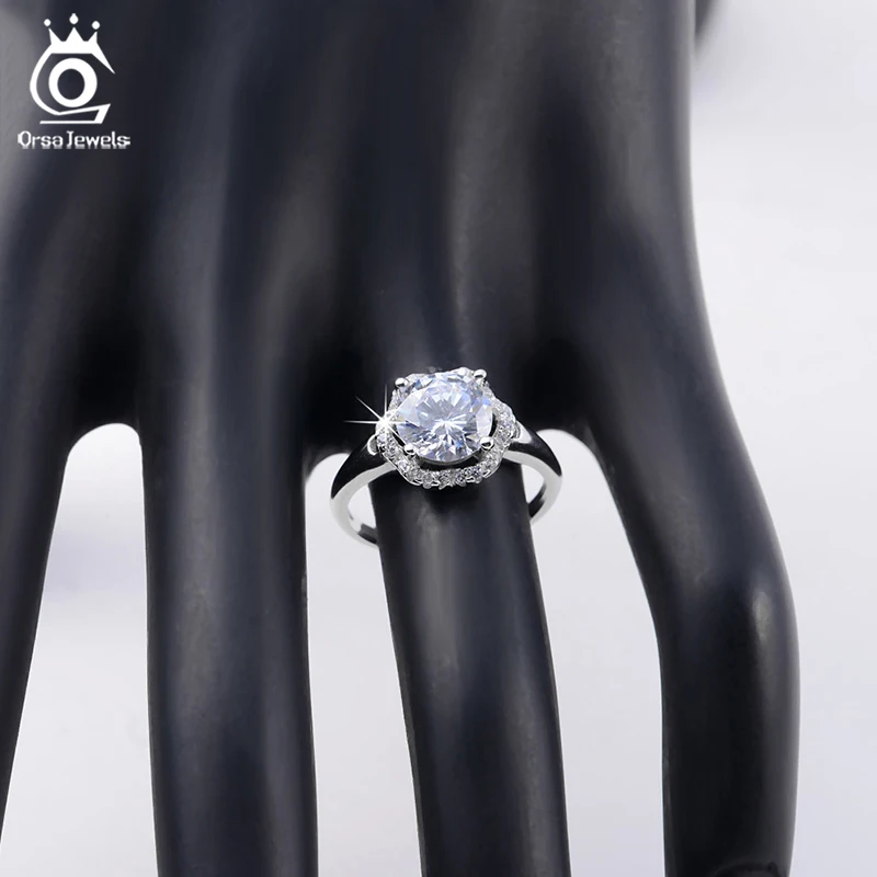 ORSA JEWELS Fashion Jewelry Flower Wedding Ring for Women Engagement Rings with One Big Luxury 2 Carat AAA Cubic Zirconia OR34