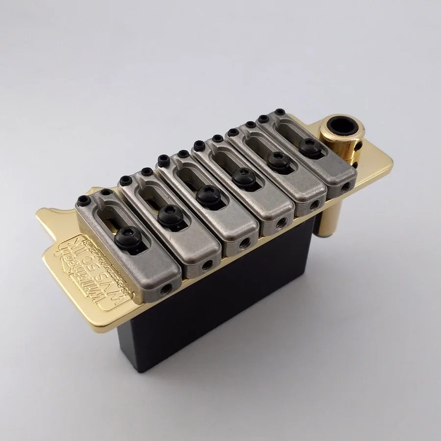 

Wilkinson WVS50IIK Guitar Tremolo Bridge Stainless Saddle Steel Block Gold Finish 2 post pionts