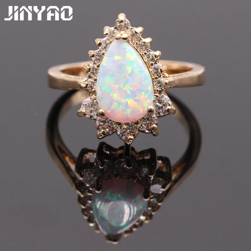 

JINYAO Beautiful Simple Waterdrop White Fire Opal AAA Zircon Champagne Gold Color Ring For Women Bridal Fashion Jewelry