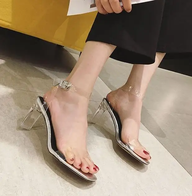 

2019 new peep-toe, one-strap high-heel fashion statement with sheer stiletto heels