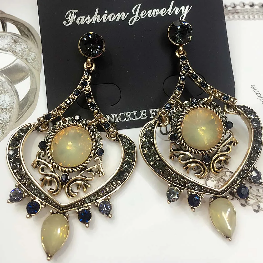 

Gary Blue Brown Glass Heart Pendant Fashion Long Earring Women Fashion Jewelry New arrival metal with gems stud for Girls E722