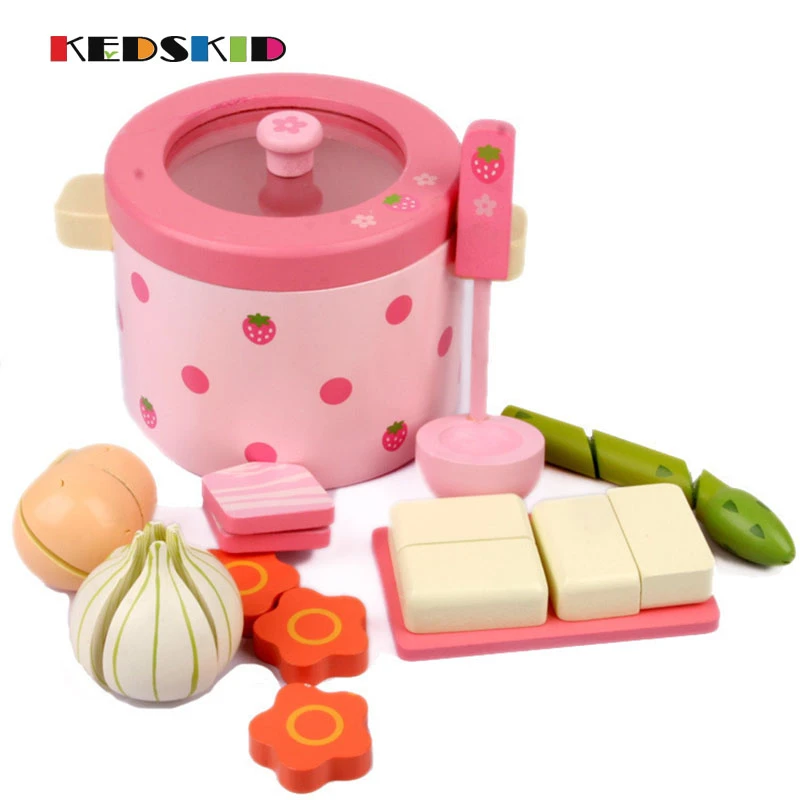 pink toy wooden kitchen
