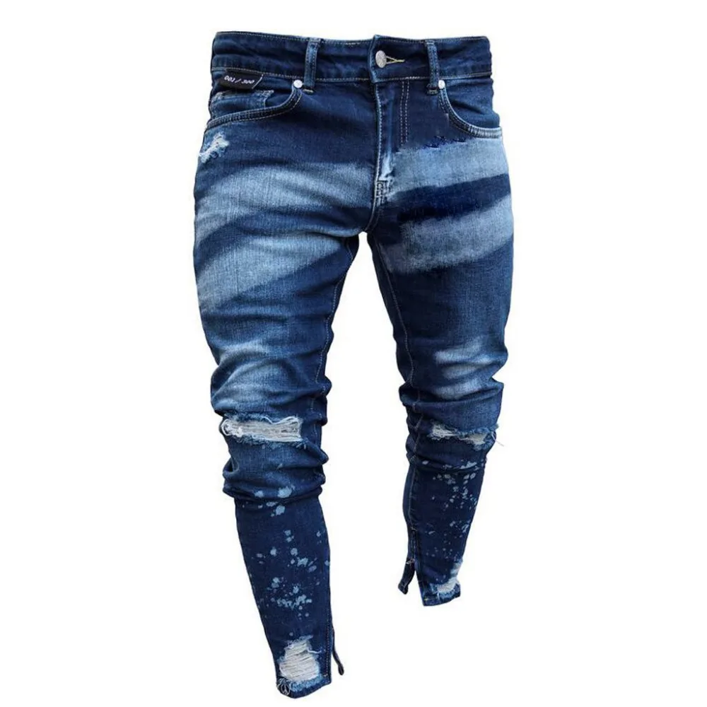 jeans shredded at the bottom