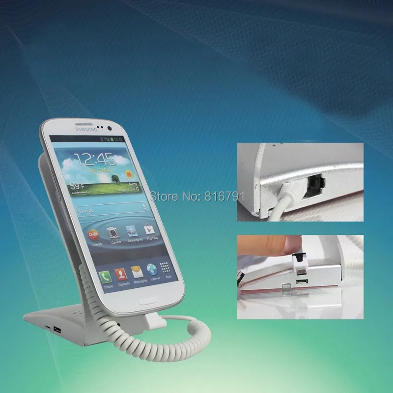 

Mobile cell phone security anti-theft Alert display stand shelf device holder with charging Alarm remote controller