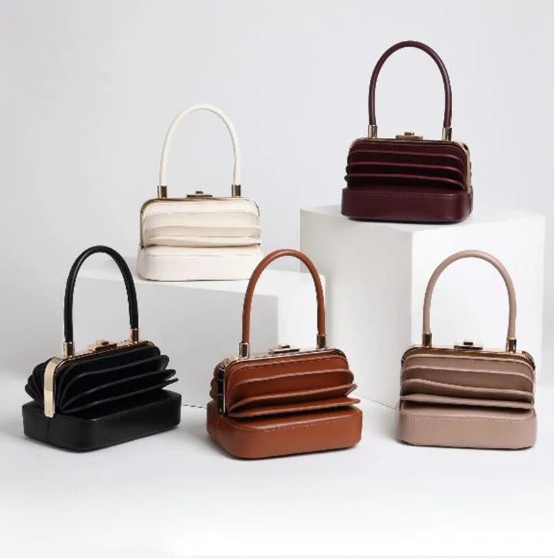 

2019 vintage unique organ leather ladies bag specially designed high quality hand folding bag cowhide box handbag