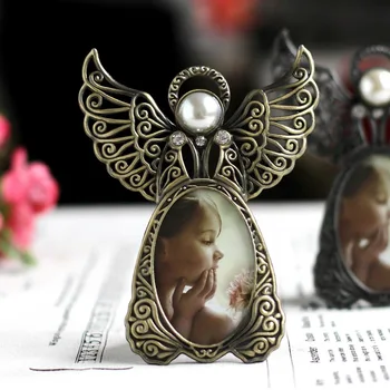 Metal Mini Pearl Photo Frames,Vintage Picture Frames Oval,Angel Wings Baby Photo Frame Home Decoration Porta Retrato Ramki Foto
Metal Mini Pearl Photo Frames,Vintage Picture Frames Oval,Angel Wings Baby Photo Frame Home Decoration Porta Retrato Ramki Foto