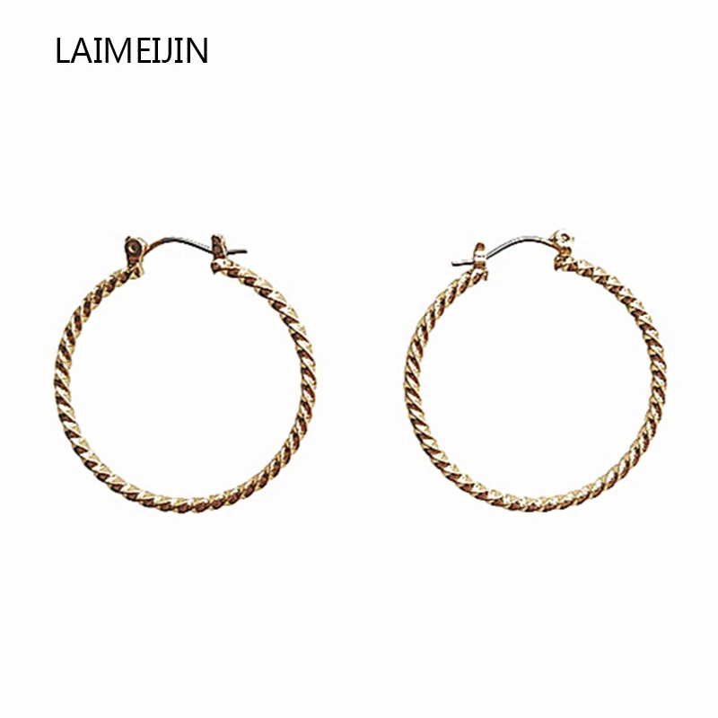 

Simple Gold Color Round Big Circle Earrings For Women Korean Temperament Wild Personality New Thread Twist Earring Hoop Earrings