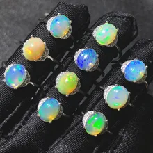 Женское кольцо из серебра 100% пробы с разноцветным опалом 7x9