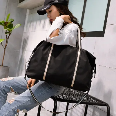 

20119 new Portable travel bag female large capacity shoulder short travel bag leisure handbag