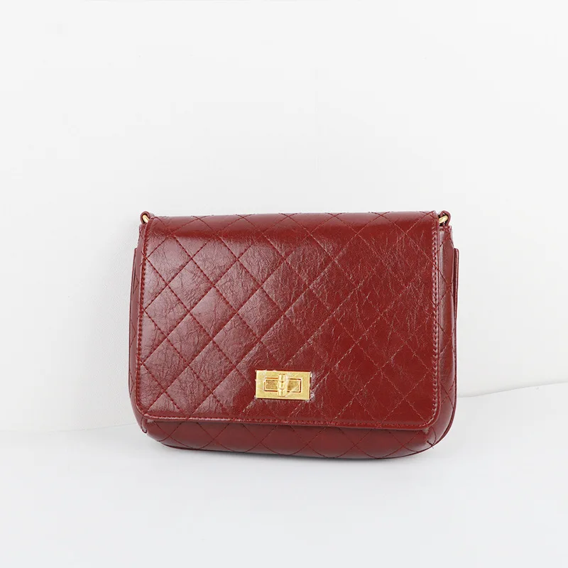 

Autumn and winter new campus wind single shoulder slung rhombic bag fragrance oil wax leather Messenger bag