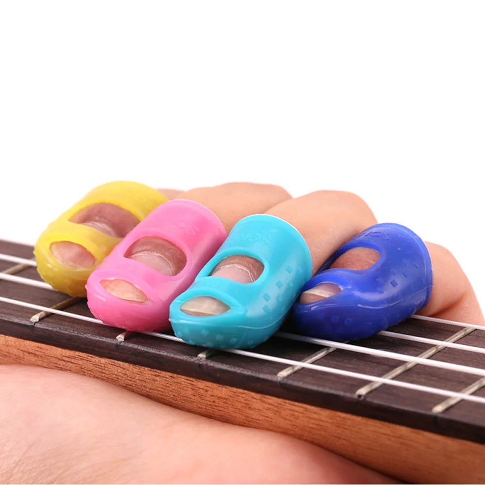 Sumifun fingertip вводная гитара, гитара пальчиковая кроватка, защищает палец, чтобы предотвратить боль кремния materialZ53001