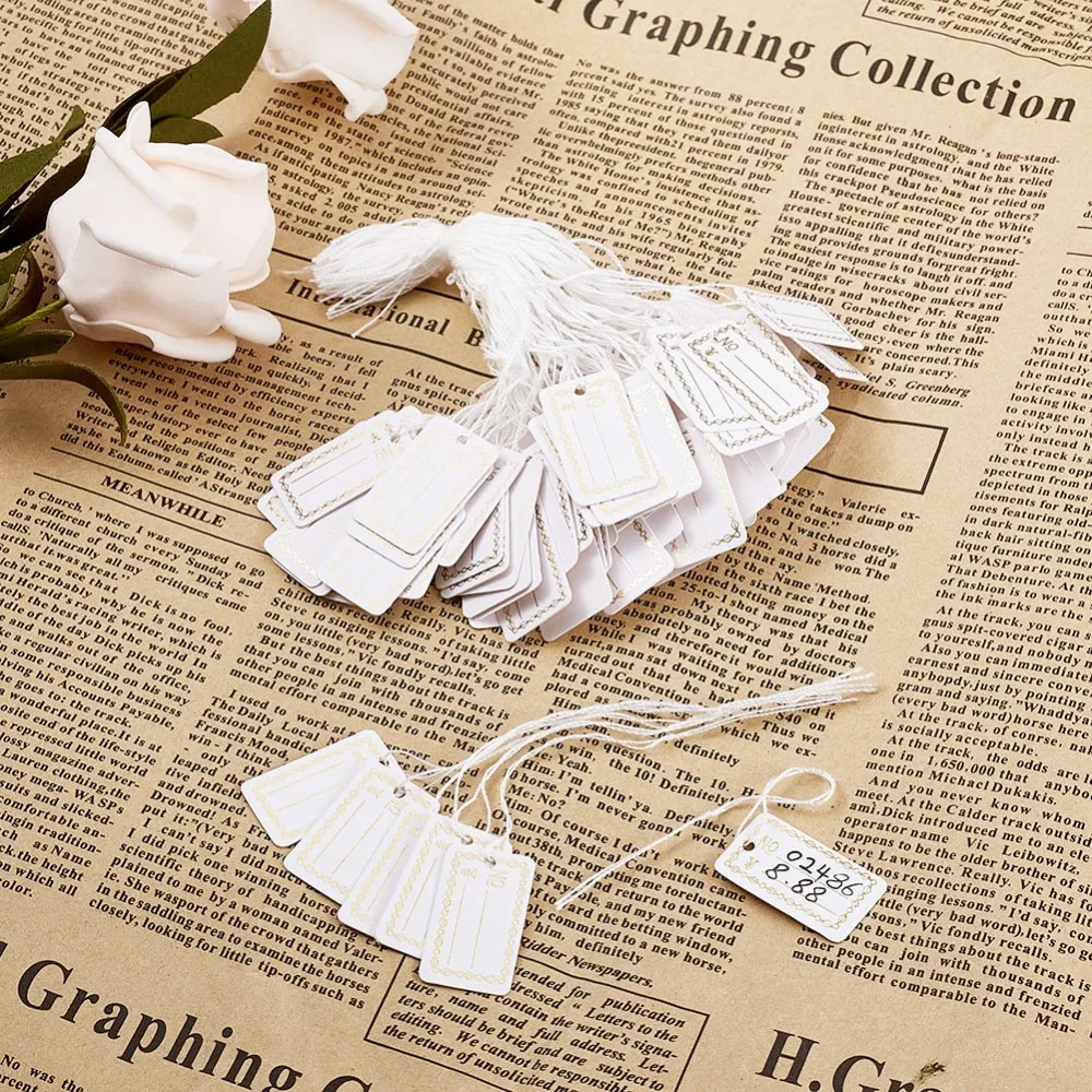 

PandaHall 500pcs 26x15mm Paper Jewelry Price Tag Hang Tags Wedding/Birthday Party Candy Boxes Price Tags for Flower/Cosmetics