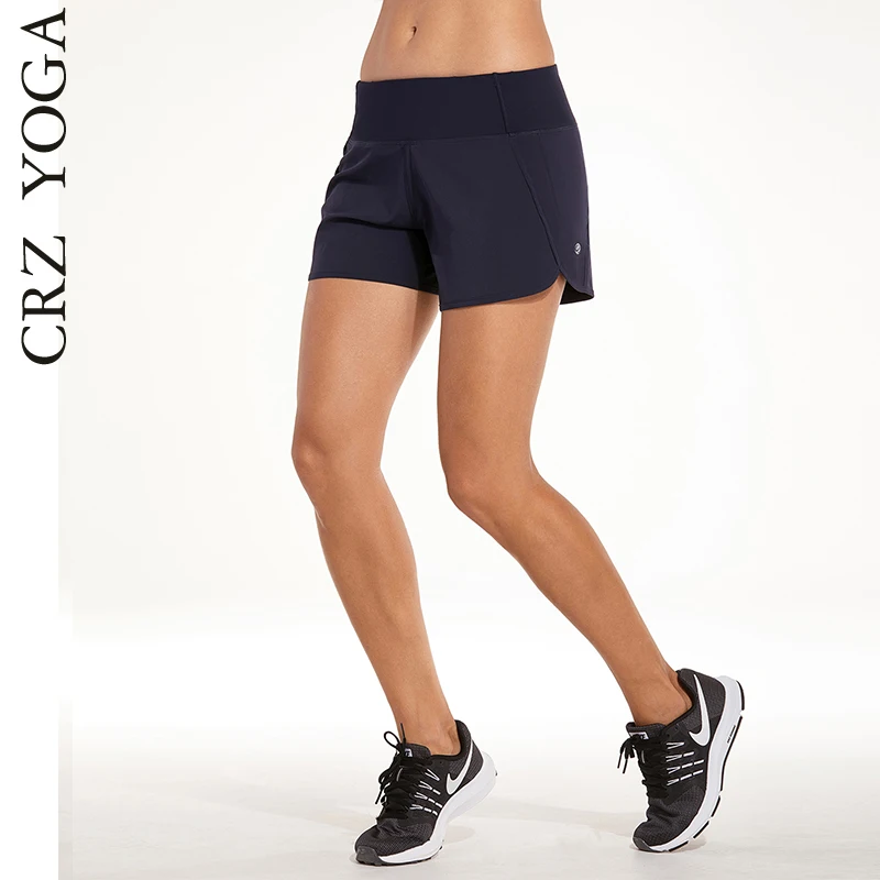 

CRZ YOGA Women's Workout Sports Running Shorts Pants With Zip Pocket - 4 inch