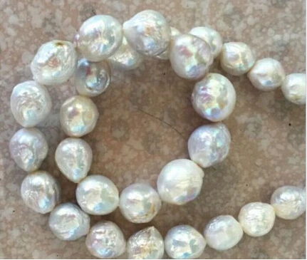 

Free shipping >>@ 1778 18INCH SOUTH SEA 12-13MM WHITE BAROQUE PEARL NECKLACE