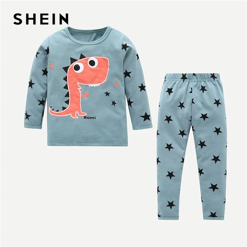 SHEIN Kiddie Toddler Boys Dinosaur And Geometric Print Tee With Pants Nightwear Kids Pajama Set Long Sleeve Casual Sleepwear SHEIN Kiddie Toddler Boys Dinosaur And Geometric Print Tee With Pants Nightwear Kids Pajama Set Long Sleeve Casual Sleepwear