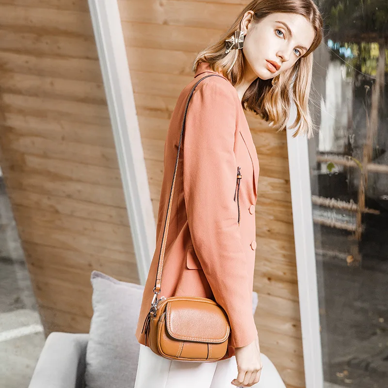 Fashion luxury oval Genuine Leather crossbody bags for women bag beautiful sewing thread decorated women messenger bags