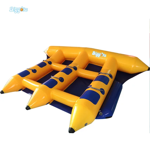 Inflatable Water Banana Boat Fly Fish 6 Inflatable Water Banana Boat Fly Fish 6 People Playing On The Beach