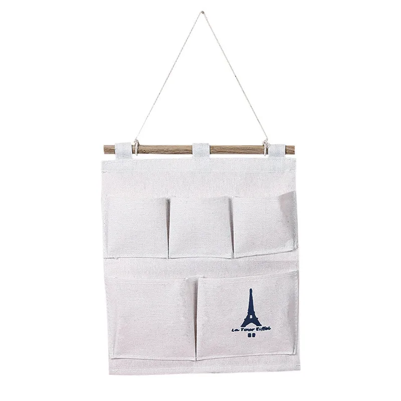 

Cotton and linen tower hanging 5 pockets storage bag Wall-mounted storage bag Cloth debris storage case for headphones organizer