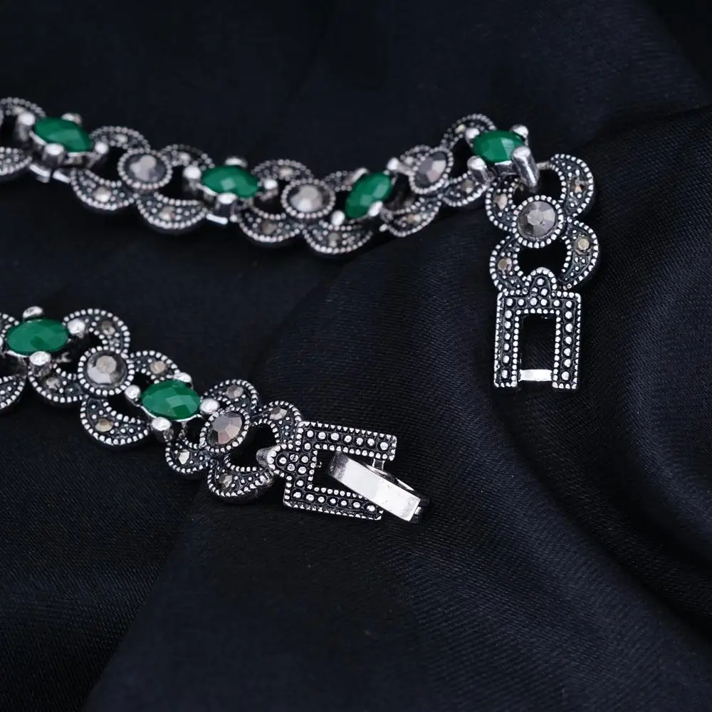 Женские браслеты с зелеными камнями