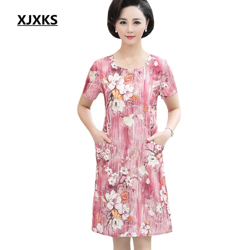 

XJXKS Round neck short-sleeved women's printed dress 2019 summer new loose plus size with pocket women's dress