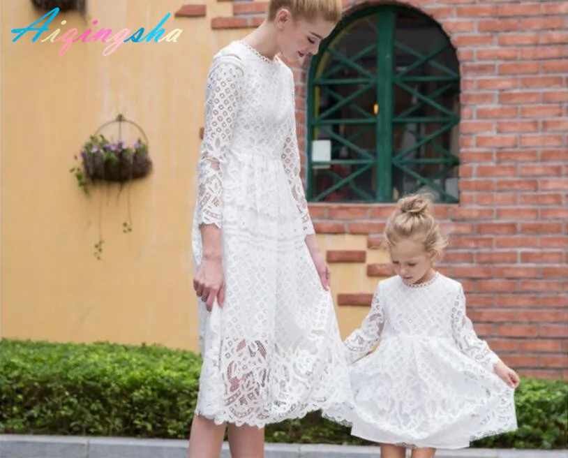 white dress mom and daughter