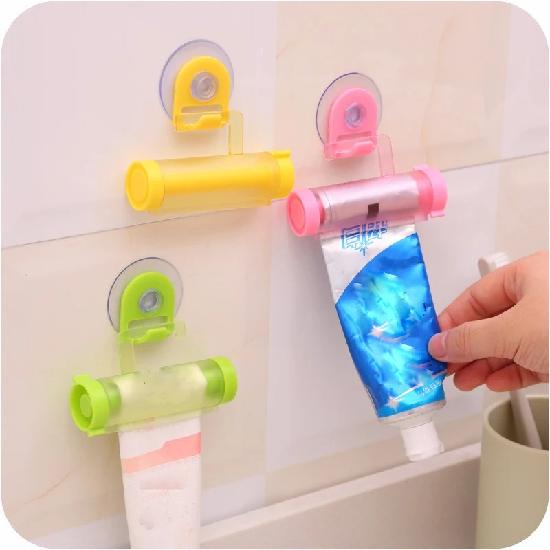 

Suction Plastic Rolling Tube Squeezer Useful Toothpaste Easy Dispenser Bathroom Toothpaste Holder Bathroom Home Accessories