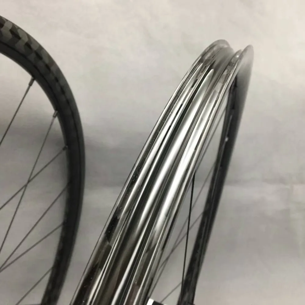 Discount center lock carbon mtb wheels 29er/27.5er/26er 24X24mm hookless mountain bike wheelset train XC race up hill Novate DT hub QR/TA 3 Discount center lock carbon mtb wheels 29er/27.5er/26er 24X24mm hookless mountain bike wheelset train XC race up hill Novate DT hub QR/TA 3