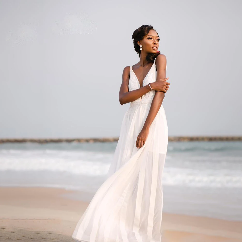 

Beach Wedding Dress Spaghetti Straps A Line Sleeveless Lace Applique Backless Deep V Neck Bridal Gown Dress Vestido De Novia