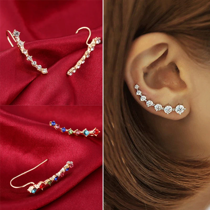 Pendiente Puño con cristales de diamantes de imitación disponible en oro o plata plateado