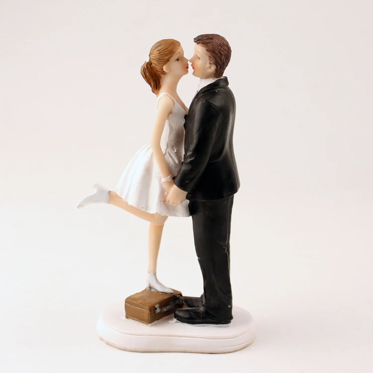 

A Kiss and We're Off Figurine Bride Groom Wedding Cake Topper