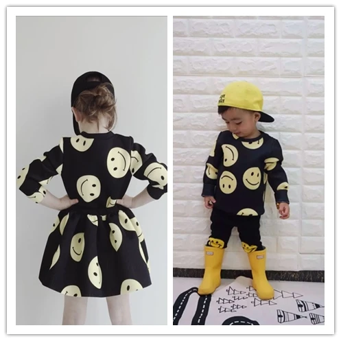 

2016 baby boys girls spacewadding cotton cloth set ( sweatshirts& skirts) smile face pattern fashion cute 1-6Y free shipping