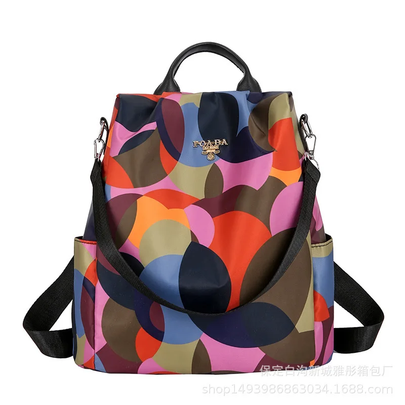 

The Large Capacity Backpack for Women Goes Well with The Wind Print Travel Bag of The Nylon Cloth Backpack College In Oxford